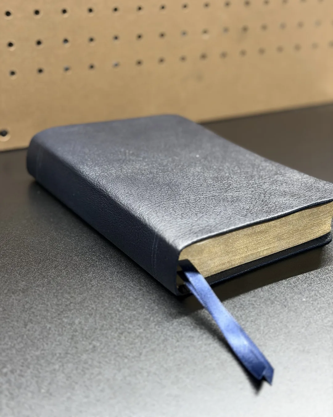 Navy leather Bible with matching ribbon and gilded edges
